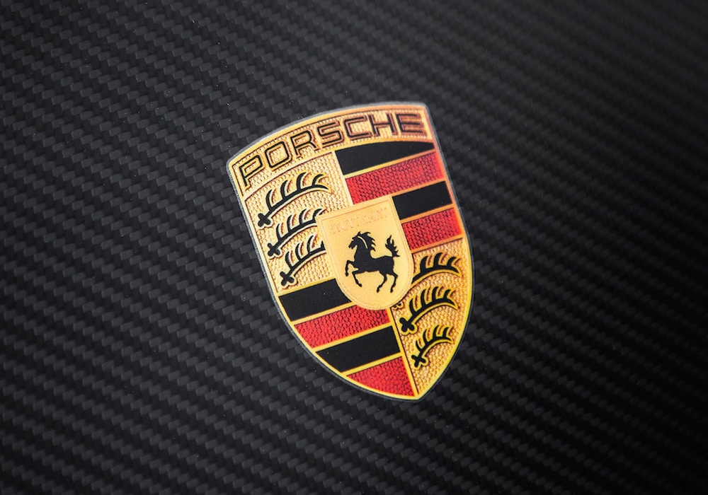 History and meaning of the Porsche Logo | Turbologo Logo Maker